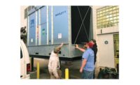 Students and instructors install a Marley NC cooling tower that serves as the centerpiece