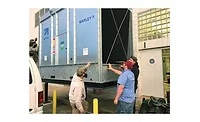 Students and instructors install a Marley NC cooling tower that serves as the centerpiece