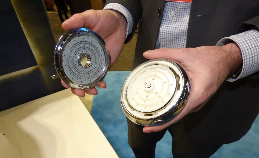 This shower head's face plate comes off so the inside can be cleaned