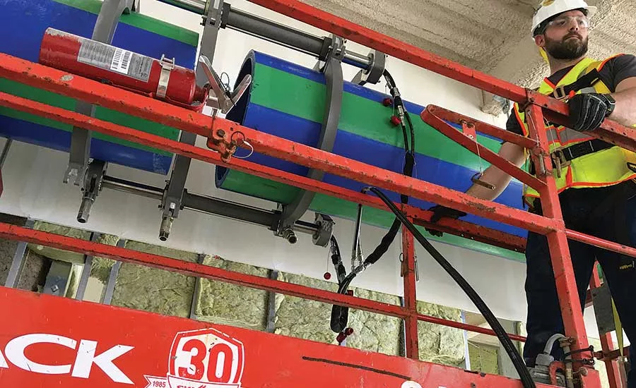 Trying to weld large-diameter pipe overhead