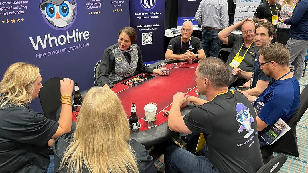 WhoHire drew attendees to its poker table.