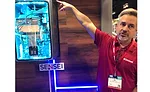 Rinnai’s Joe Holliday demonstrates the company’s new Sensei tankless water heater