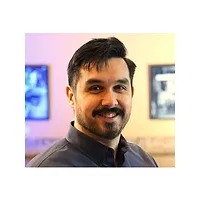 Spencer Pope headshot with a white border