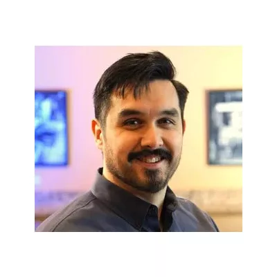 Spencer Pope headshot with a white border