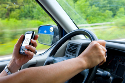 Driving while using cell phone